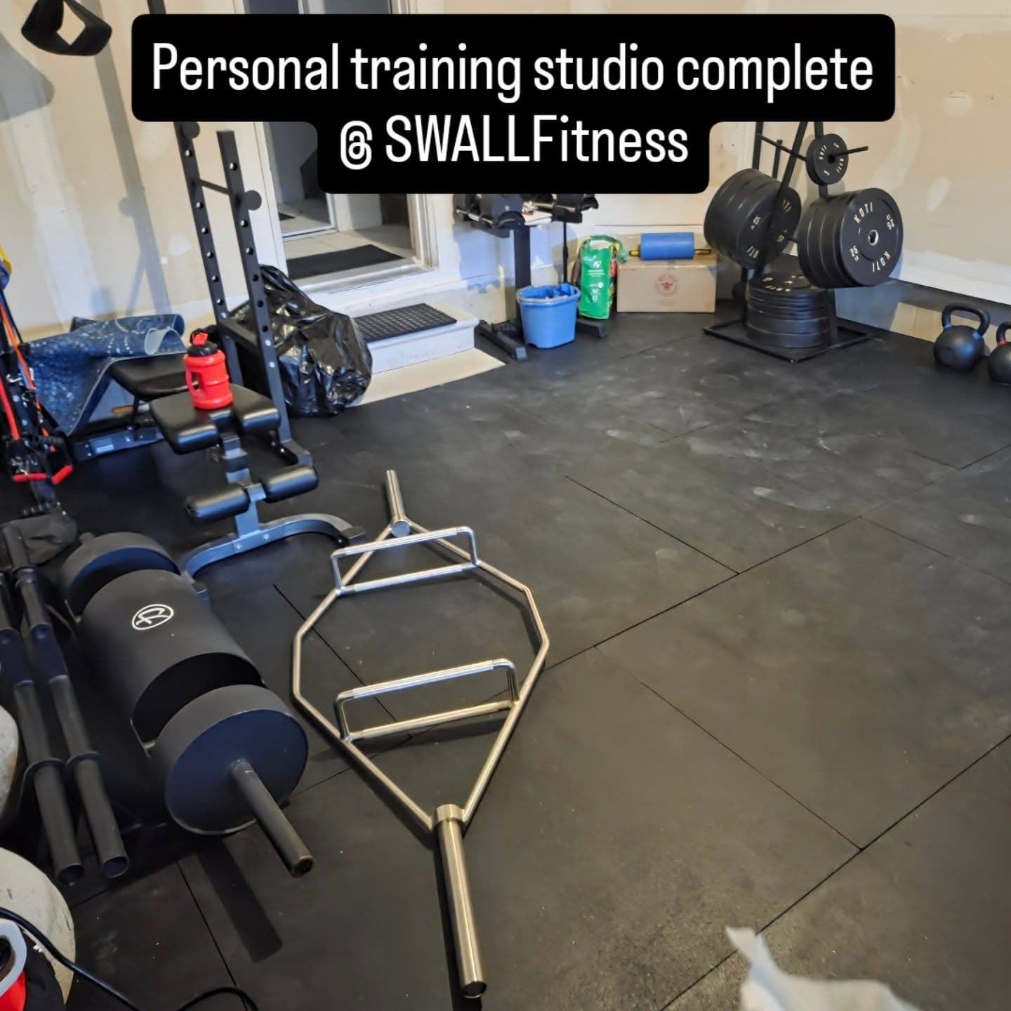 Complete private training studio at SWALLFitness with pads and bars